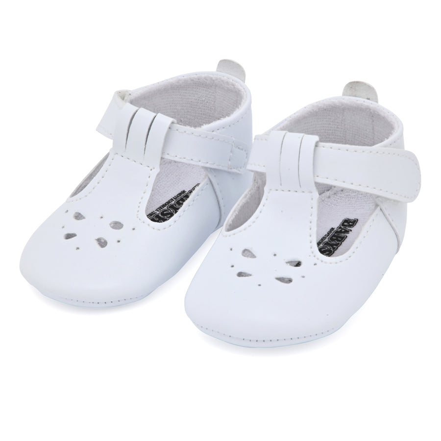 A pair of white Mary Jane T-strap baby shoes with a velcro closure, designed for infants.